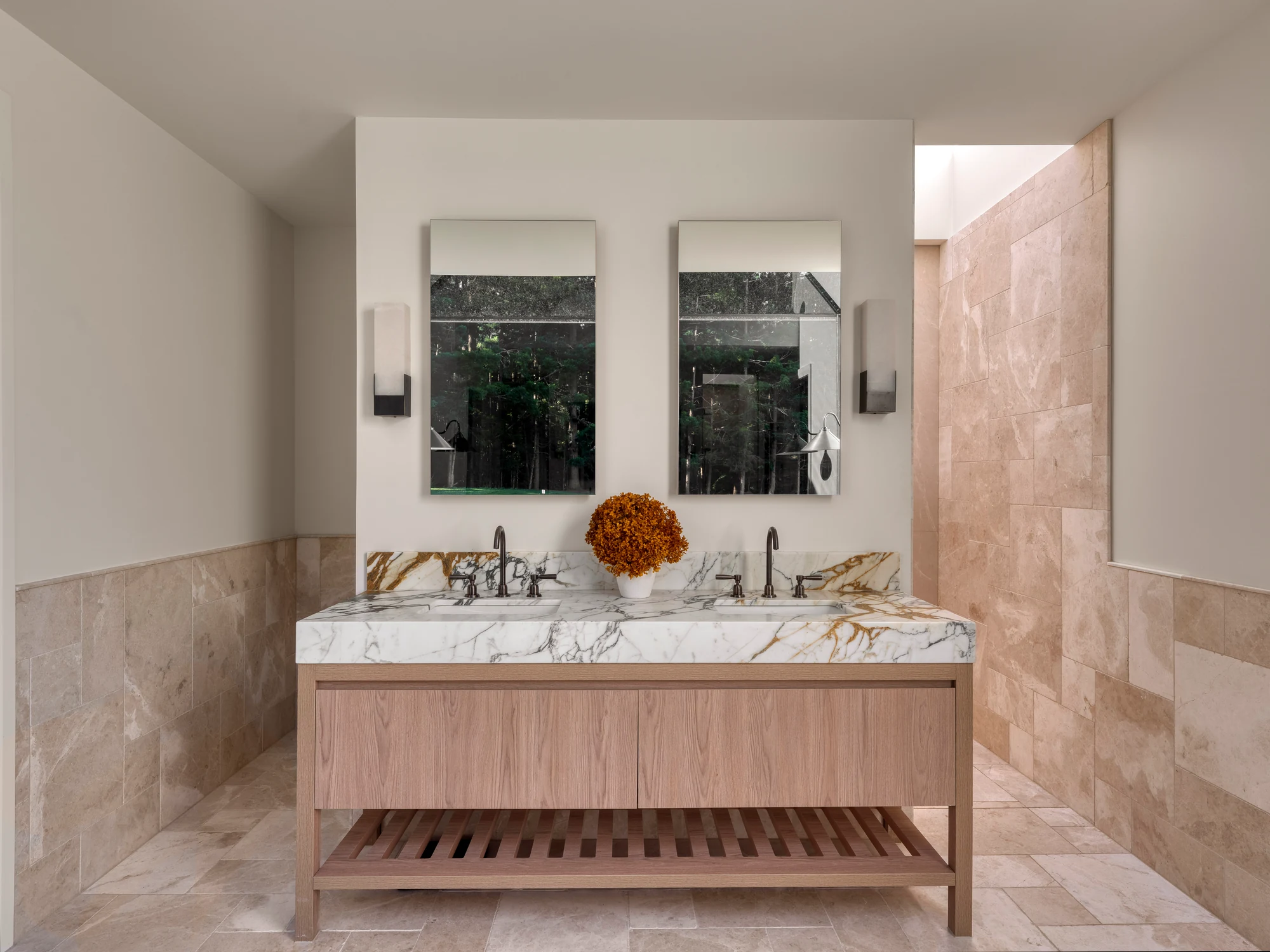 A marble vanity, timber joinery and stone floors from Paradigm’s project image collection.